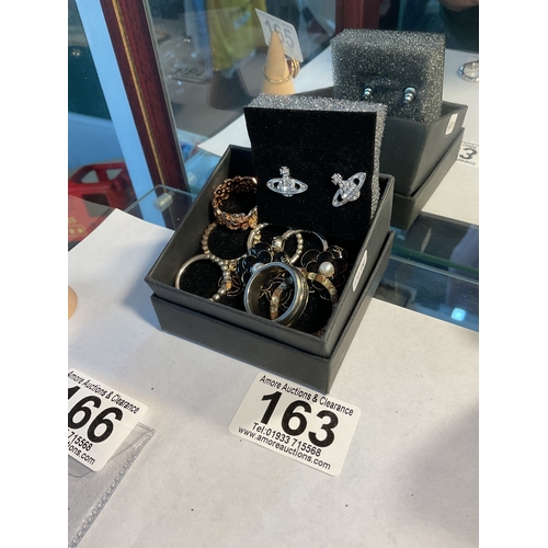 163 - Assorted costume rings