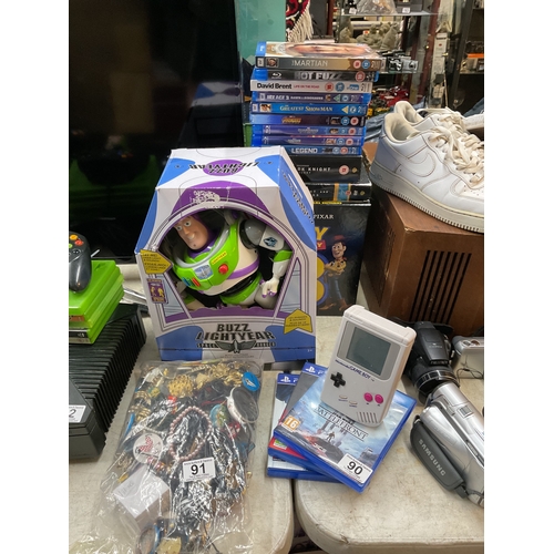 90 - Large  buzz lightyear toy, PS4 games, gameboy clock etc