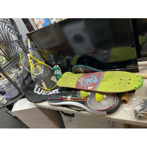 96 - Vintage 80's skateboard, tennis rackets etc