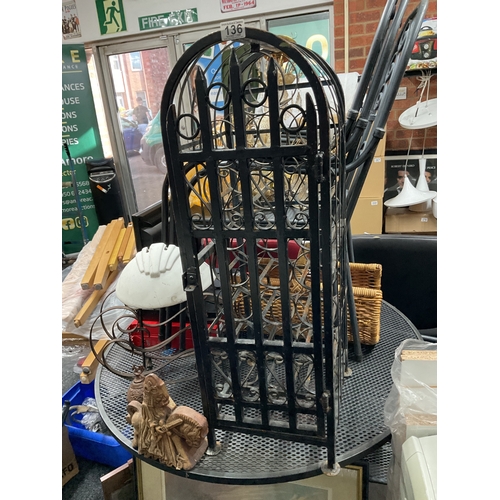 Wrought iron gothic style wine rack with door & bronze style figures etc