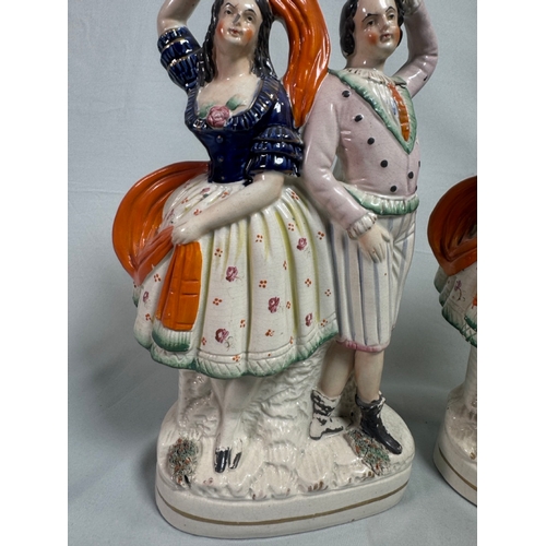 17 - Pair Antique Staffordshire Style Flatback Figurines Dancing Couple Spill Vases  Polychrome figures. ... 