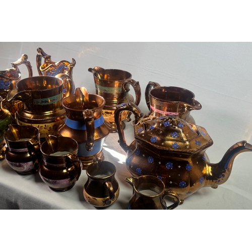 25 - Victorian Lustre Copper Tea Set Teapot Jugs Creamers Cups Assorted  Large lustreware group. Mixed co... 