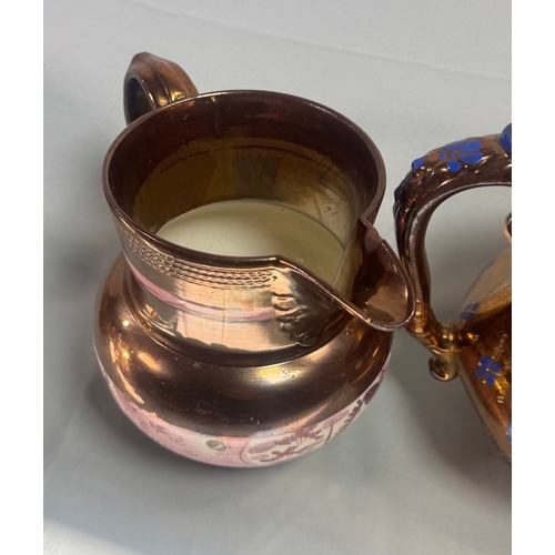 25 - Victorian Lustre Copper Tea Set Teapot Jugs Creamers Cups Assorted  Large lustreware group. Mixed co... 