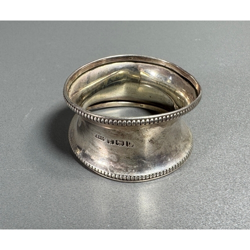 56 - Hallmarked Silver Napkin Ring Beaded Edge Marked Bros  Classic tableware piece. Fair condition; plat... 