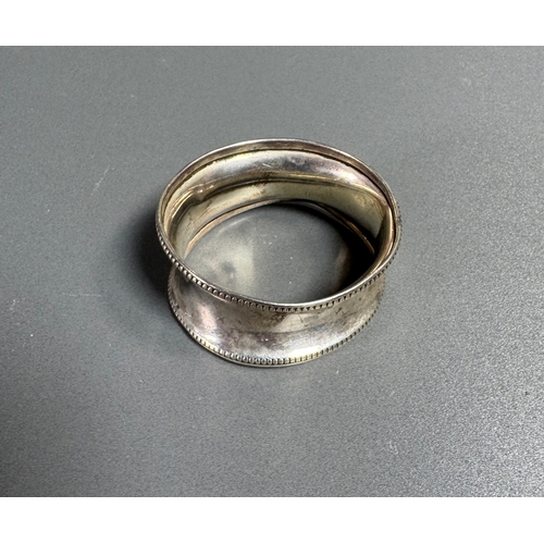 56 - Hallmarked Silver Napkin Ring Beaded Edge Marked Bros  Classic tableware piece. Fair condition; plat... 