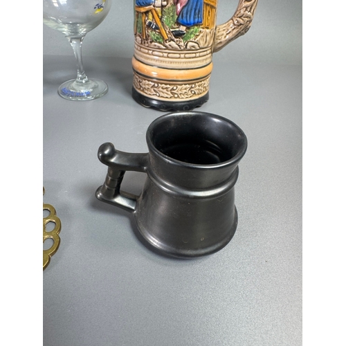 292 - Mixed decorative collector’s lot: ceramic stein, Pilkingtons mug, treen barrel, brass novelties, whi... 
