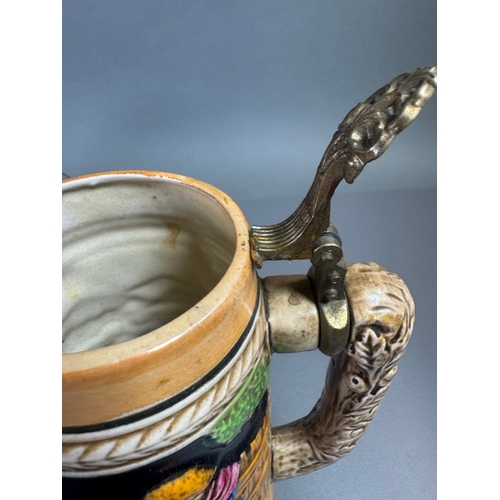 292 - Mixed decorative collector’s lot: ceramic stein, Pilkingtons mug, treen barrel, brass novelties, whi... 