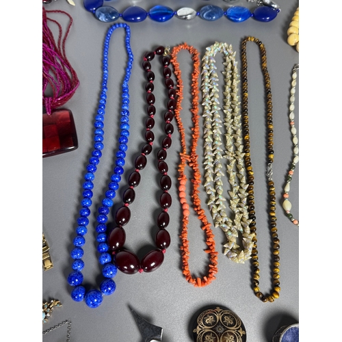 51 - Large mixed vintage jewellery lot — necklaces, brooches, earrings, watches; pair marked 