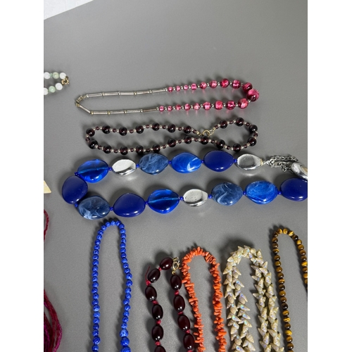 51 - Large mixed vintage jewellery lot — necklaces, brooches, earrings, watches; pair marked 
