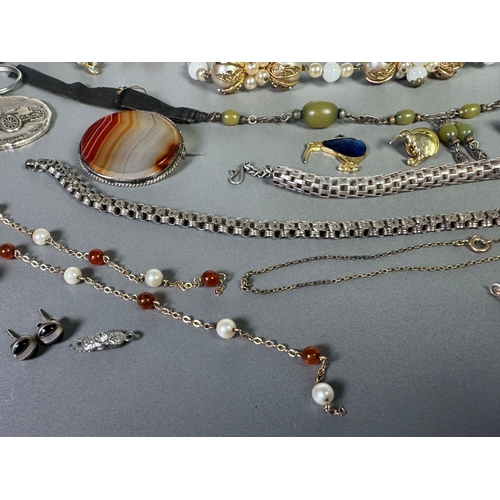 51 - Large mixed vintage jewellery lot — necklaces, brooches, earrings, watches; pair marked 