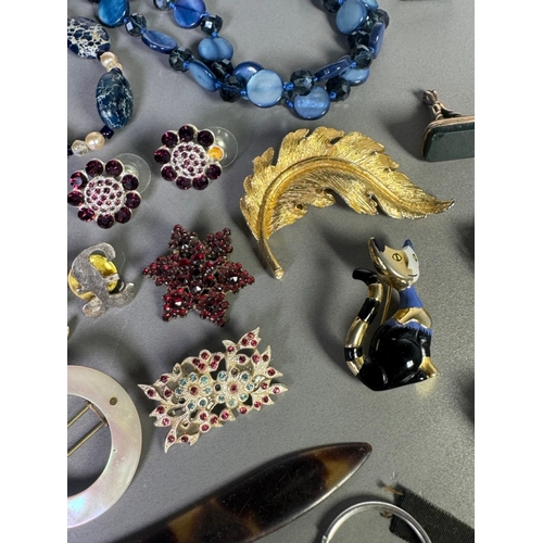 51 - Large mixed vintage jewellery lot — necklaces, brooches, earrings, watches; pair marked 