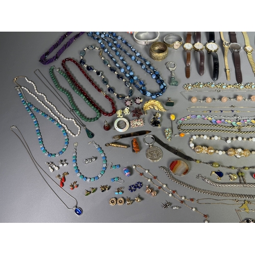 51 - Large mixed vintage jewellery lot — necklaces, brooches, earrings, watches; pair marked 