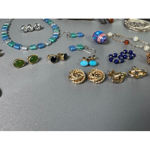 51 - Large mixed vintage jewellery lot — necklaces, brooches, earrings, watches; pair marked 