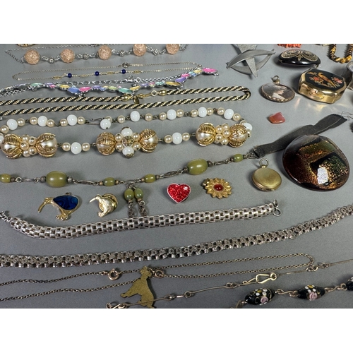 51 - Large mixed vintage jewellery lot — necklaces, brooches, earrings, watches; pair marked 