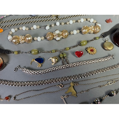 51 - Large mixed vintage jewellery lot — necklaces, brooches, earrings, watches; pair marked 