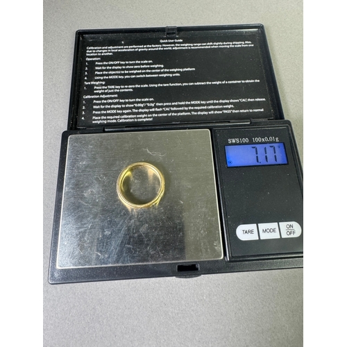 49 - 18ct (750) gold five‑stone diamond band — marquise & round cuts, UK hallmarks, 7.17g.

Fair vintage ... 