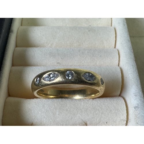 49 - 18ct (750) gold five‑stone diamond band — marquise & round cuts, UK hallmarks, 7.17g.

Fair vintage ... 