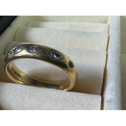 49 - 18ct (750) gold five‑stone diamond band — marquise & round cuts, UK hallmarks, 7.17g.

Fair vintage ... 