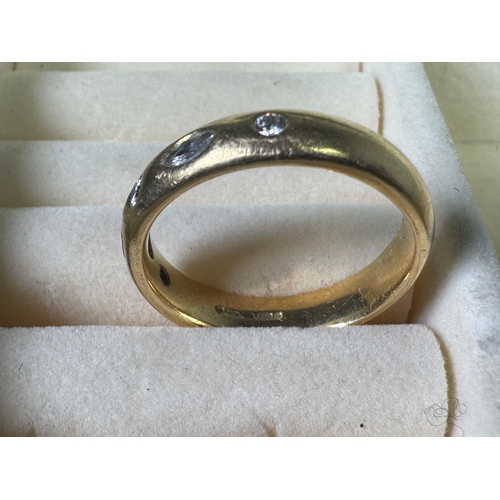 49 - 18ct (750) gold five‑stone diamond band — marquise & round cuts, UK hallmarks, 7.17g.

Fair vintage ... 
