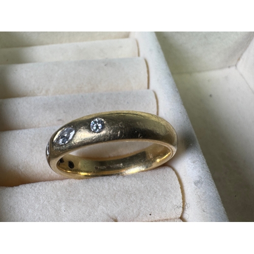 49 - 18ct (750) gold five‑stone diamond band — marquise & round cuts, UK hallmarks, 7.17g.

Fair vintage ... 