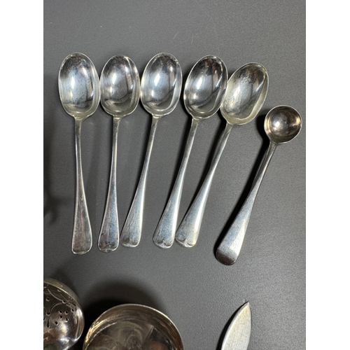 43 - Assorted hallmarked sterling & silver‑plate flatware lot — teaspoons, dessert/serving spoons, sugar ... 