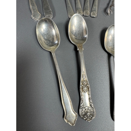 43 - Assorted hallmarked sterling & silver‑plate flatware lot — teaspoons, dessert/serving spoons, sugar ... 