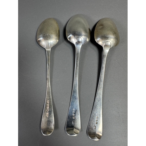42 - English hallmarked sterling tablespoons — three large spoons, 207g total, assorted makers & date let... 