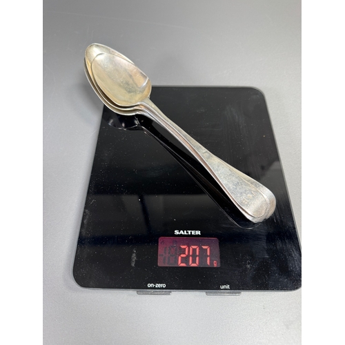 42 - English hallmarked sterling tablespoons — three large spoons, 207g total, assorted makers & date let... 
