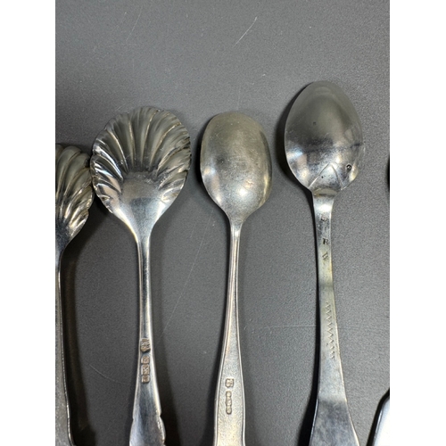 40 - Lot of Assorted English hallmarked sterling spoons and small serving spoons, tested, various pattern... 