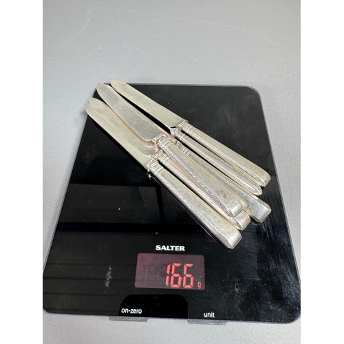 36 - Cased set of six English hallmarked sterling silver table knives, patterned handles, fitted case — 1... 