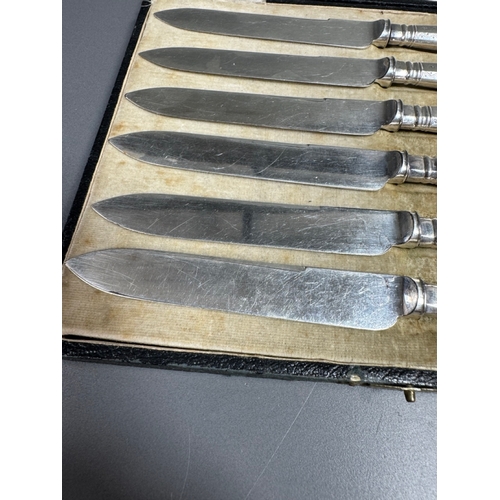 36 - Cased set of six English hallmarked sterling silver table knives, patterned handles, fitted case — 1... 