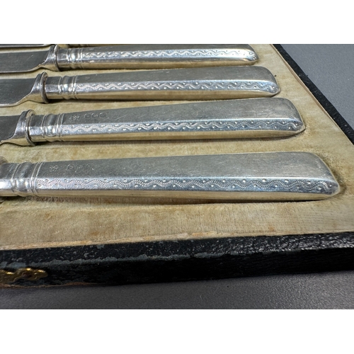 36 - Cased set of six English hallmarked sterling silver table knives, patterned handles, fitted case — 1... 