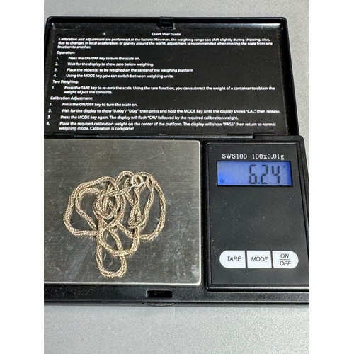 34 - Mixed silver lot — three coin‑charm bangles, cut 1939 farthing pendant on chain and assorted silver ... 