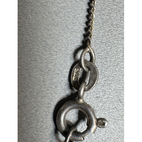 34 - Mixed silver lot — three coin‑charm bangles, cut 1939 farthing pendant on chain and assorted silver ... 