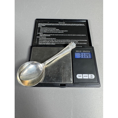 27 - English hallmarked sterling tea spoon & small cream soup spoon — decorative handles (combined weight... 