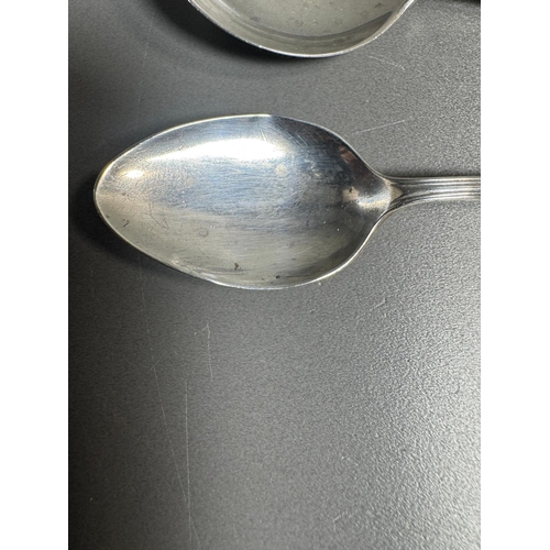 27 - English hallmarked sterling tea spoon & small cream soup spoon — decorative handles (combined weight... 