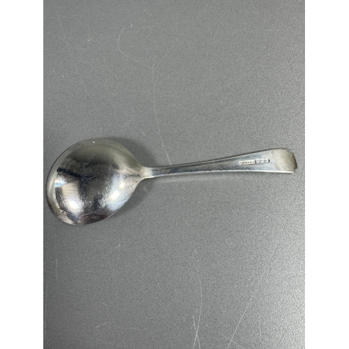 27 - English hallmarked sterling tea spoon & small cream soup spoon — decorative handles (combined weight... 