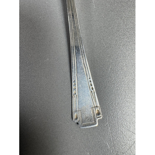 27 - English hallmarked sterling tea spoon & small cream soup spoon — decorative handles (combined weight... 