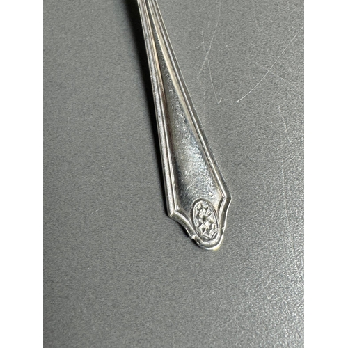 27 - English hallmarked sterling tea spoon & small cream soup spoon — decorative handles (combined weight... 