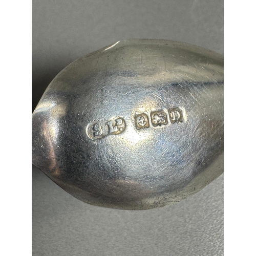 27 - English hallmarked sterling tea spoon & small cream soup spoon — decorative handles (combined weight... 