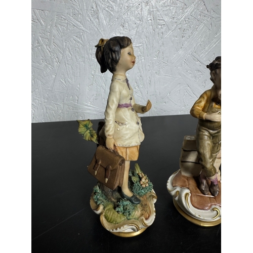 585 - Set of 3 Italian Figurines – Hand‑Painted Capodimonte‑Style Children (Shipping Available).

Charming... 