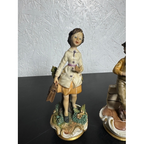 585 - Set of 3 Italian Figurines – Hand‑Painted Capodimonte‑Style Children (Shipping Available).

Charming... 