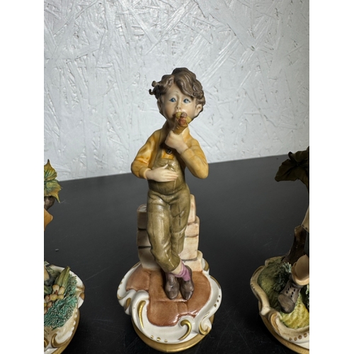 585 - Set of 3 Italian Figurines – Hand‑Painted Capodimonte‑Style Children (Shipping Available).

Charming... 