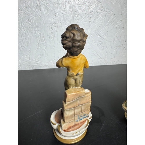 585 - Set of 3 Italian Figurines – Hand‑Painted Capodimonte‑Style Children (Shipping Available).

Charming... 