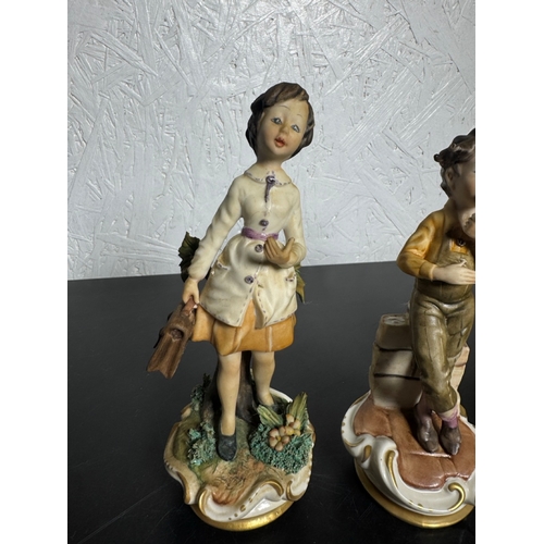 585 - Set of 3 Italian Figurines – Hand‑Painted Capodimonte‑Style Children (Shipping Available).

Charming... 