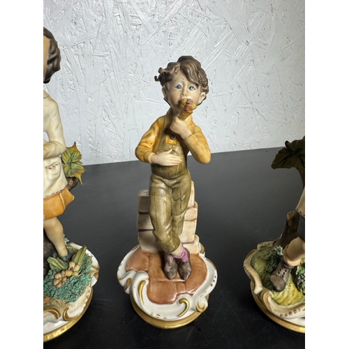 585 - Set of 3 Italian Figurines – Hand‑Painted Capodimonte‑Style Children (Shipping Available).

Charming... 