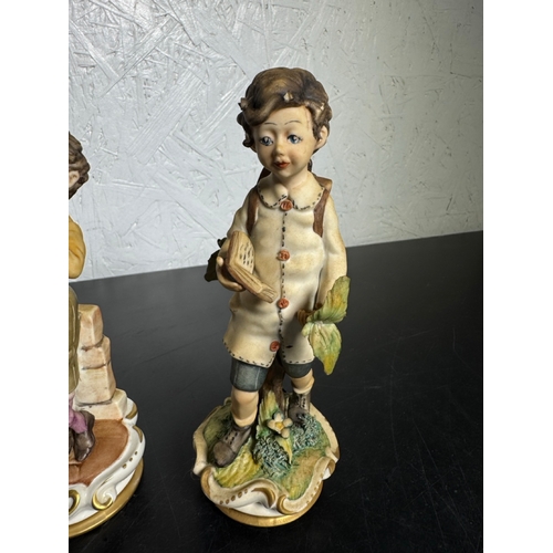 585 - Set of 3 Italian Figurines – Hand‑Painted Capodimonte‑Style Children (Shipping Available).

Charming... 