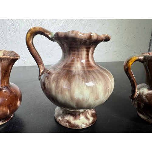 590 - Trio of Vintage German Drip‑Glaze Pottery Jugs – Brown & Cream (Shipping Available)  Attractive set ... 