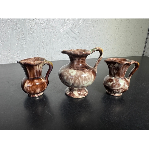 590 - Trio of Vintage German Drip‑Glaze Pottery Jugs – Brown & Cream (Shipping Available)  Attractive set ... 