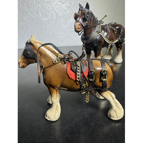 595 - Pair of Beswick-Style Shire Horses with Full Harness (Shipping Available).

A charming pair of ceram... 